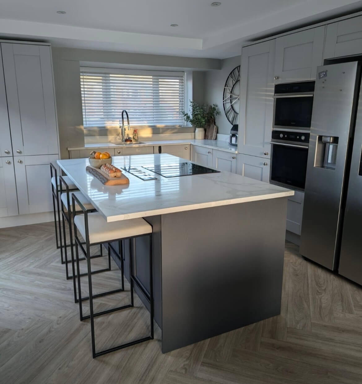 Light grey shaker kitchen before professional kitchen cabinet painting by Wilkinson Specialist Sprays in Wombourne.