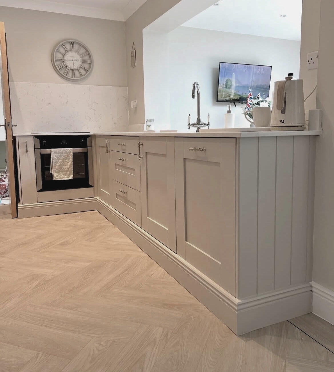 Elegant taupe shaker kitchen professionally hand painted with a durable furniture-grade finish in Wombourne.